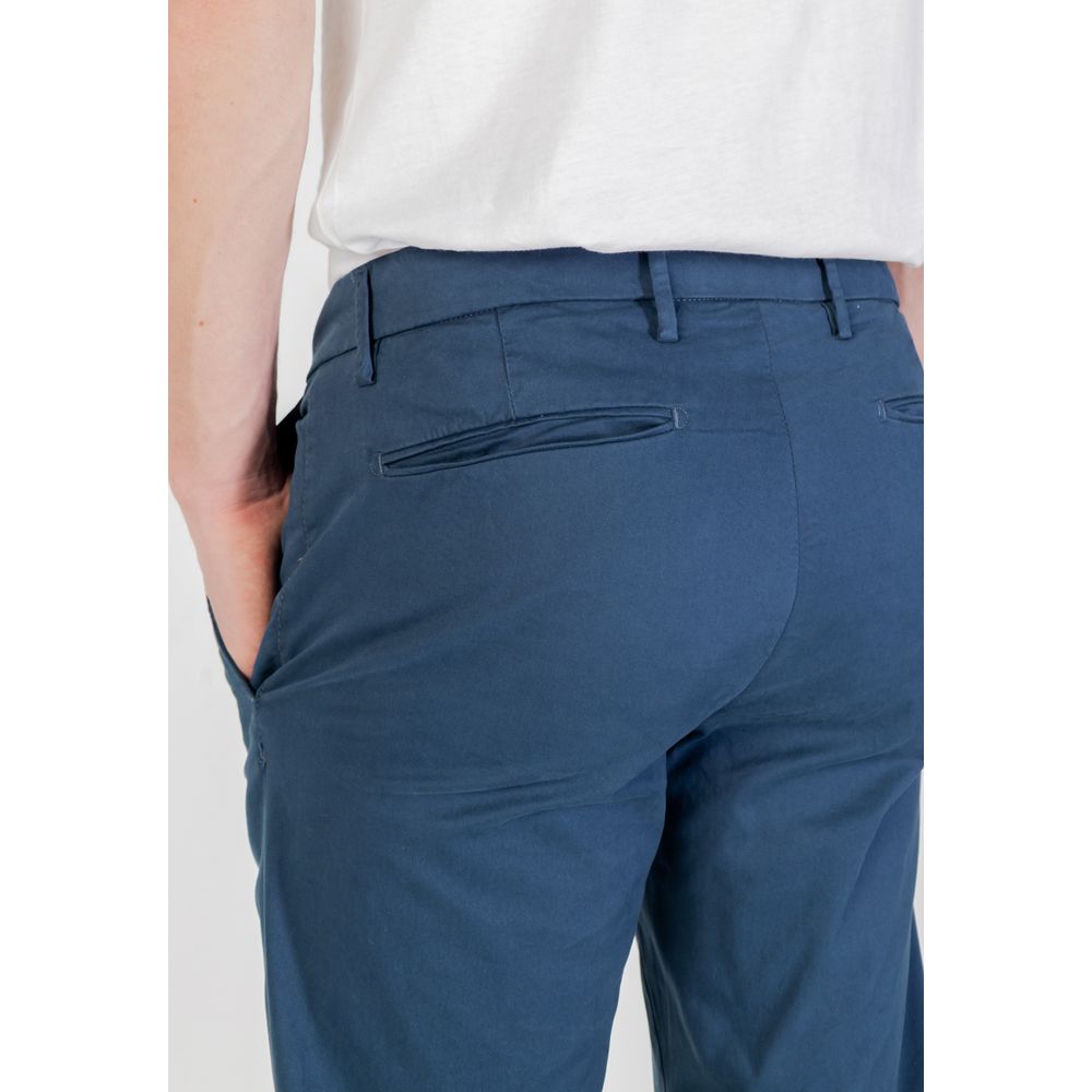 Luxury men’s designer pants – tailored trousers, chinos, premium fabric, classic style from top fashion brands.