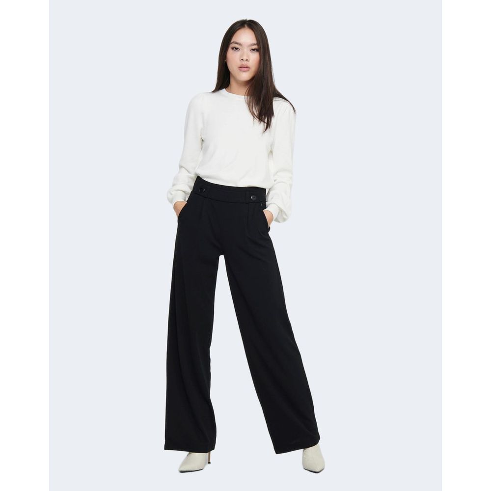 Luxury women’s designer pants – tailored trousers, wide-leg styles, premium fabrics from top fashion brands.