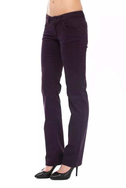 Purple pants worn by a person on a white background