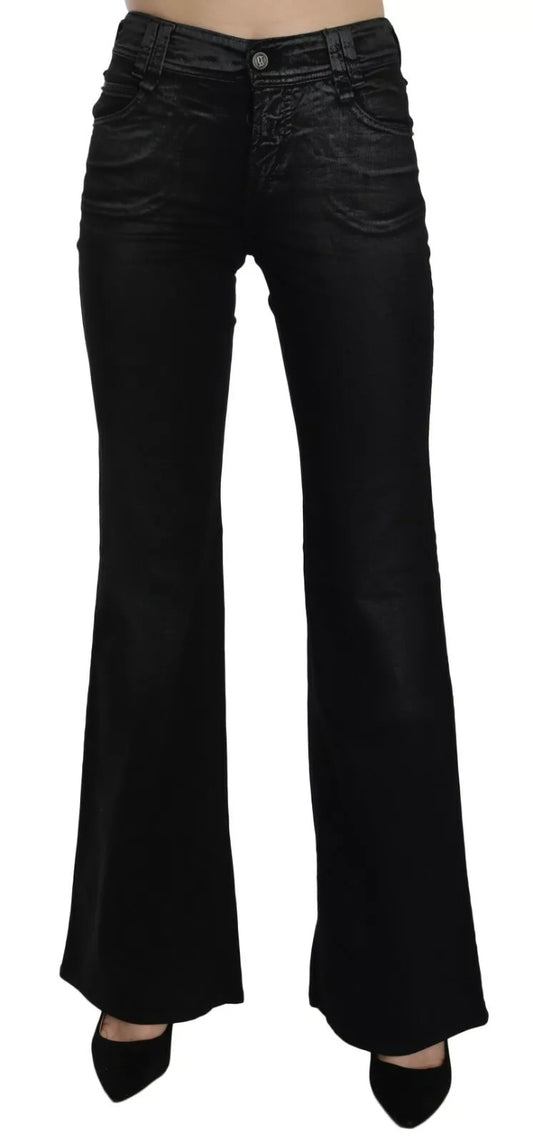 Black flared jeans on a white background